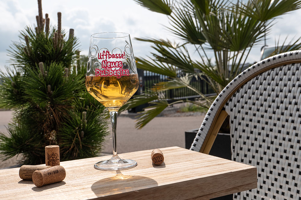 Uffbasse! Neues Dubbeglas