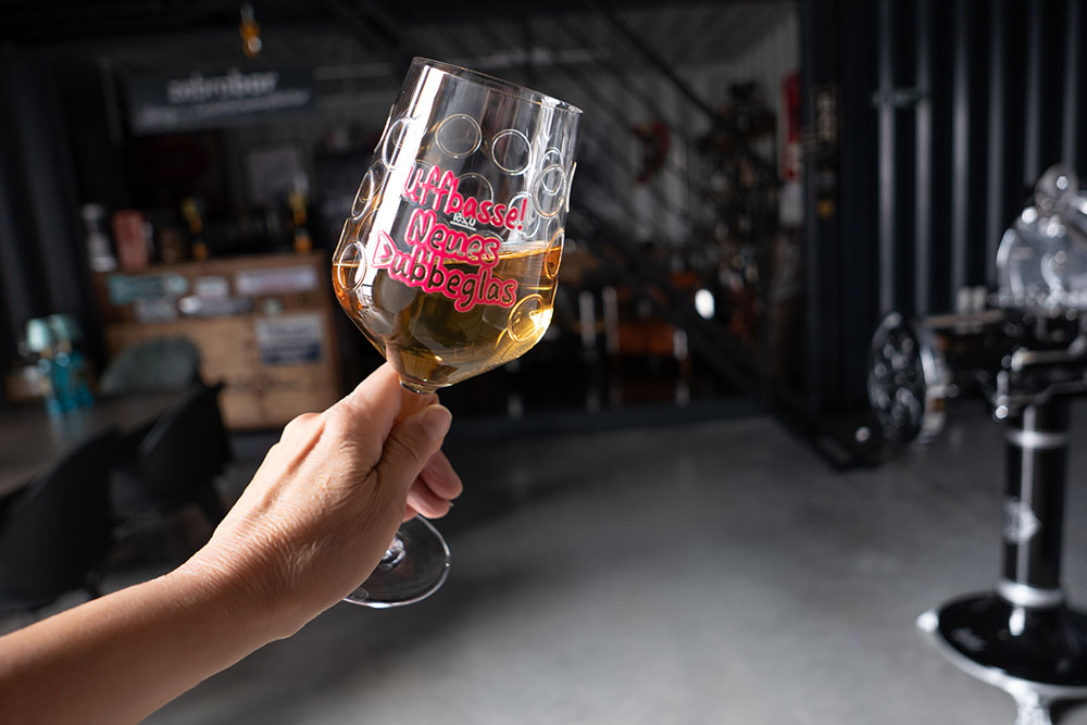 Uffbasse! Neues Dubbeglas